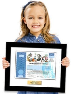 girl holding framed Disney stock