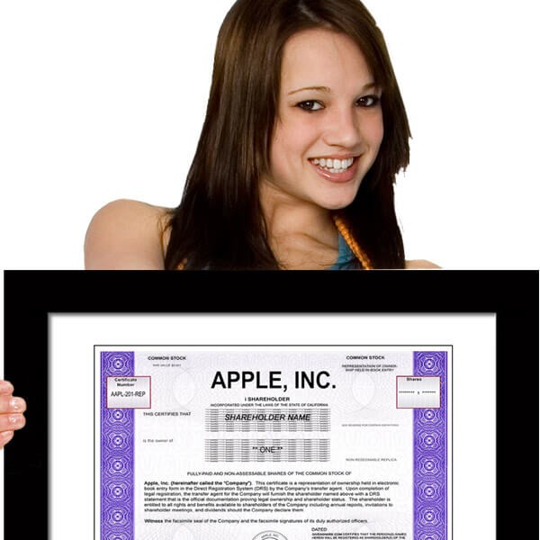 girl holding apple stock